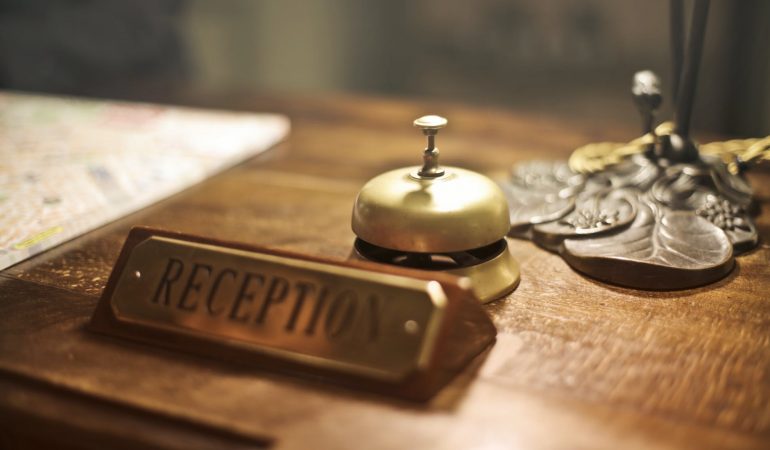reception desk with antique hotel bell